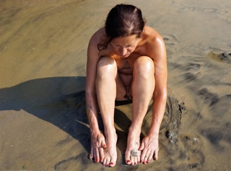 spiaggia matura pornografico immagini