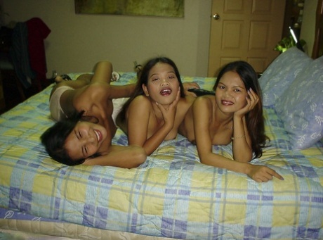 trio asiático muito pornográfico fotos