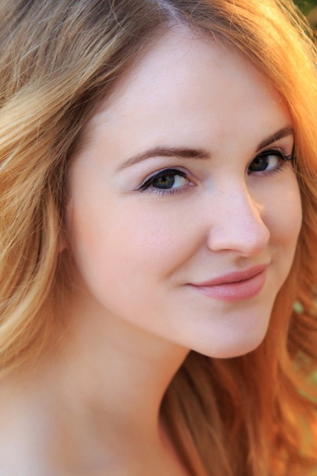 beautiful redhead top image
